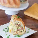 A savory stuffed bundt cake always makes a gorgeous brunch presentation. No one has to know how easy it is to make. Get the recipe on GoodieGodmother.com