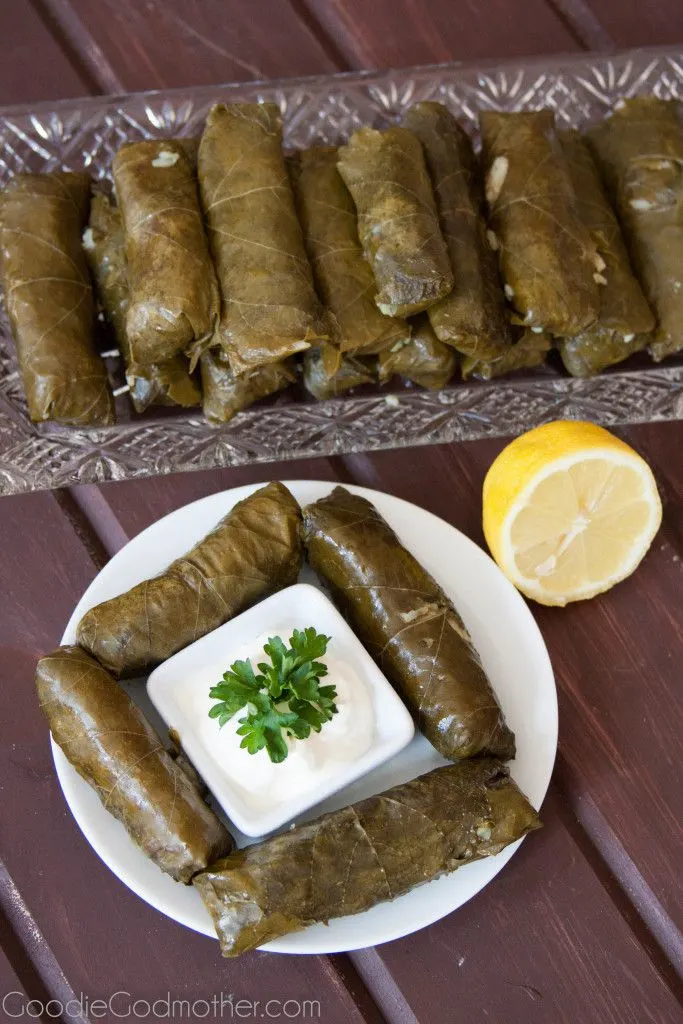 These traditional Middle Eastern stuffed grape leaves are filled with rice and meat to make a filling, hand held meal. Serve with sour cream or plain yogurt!