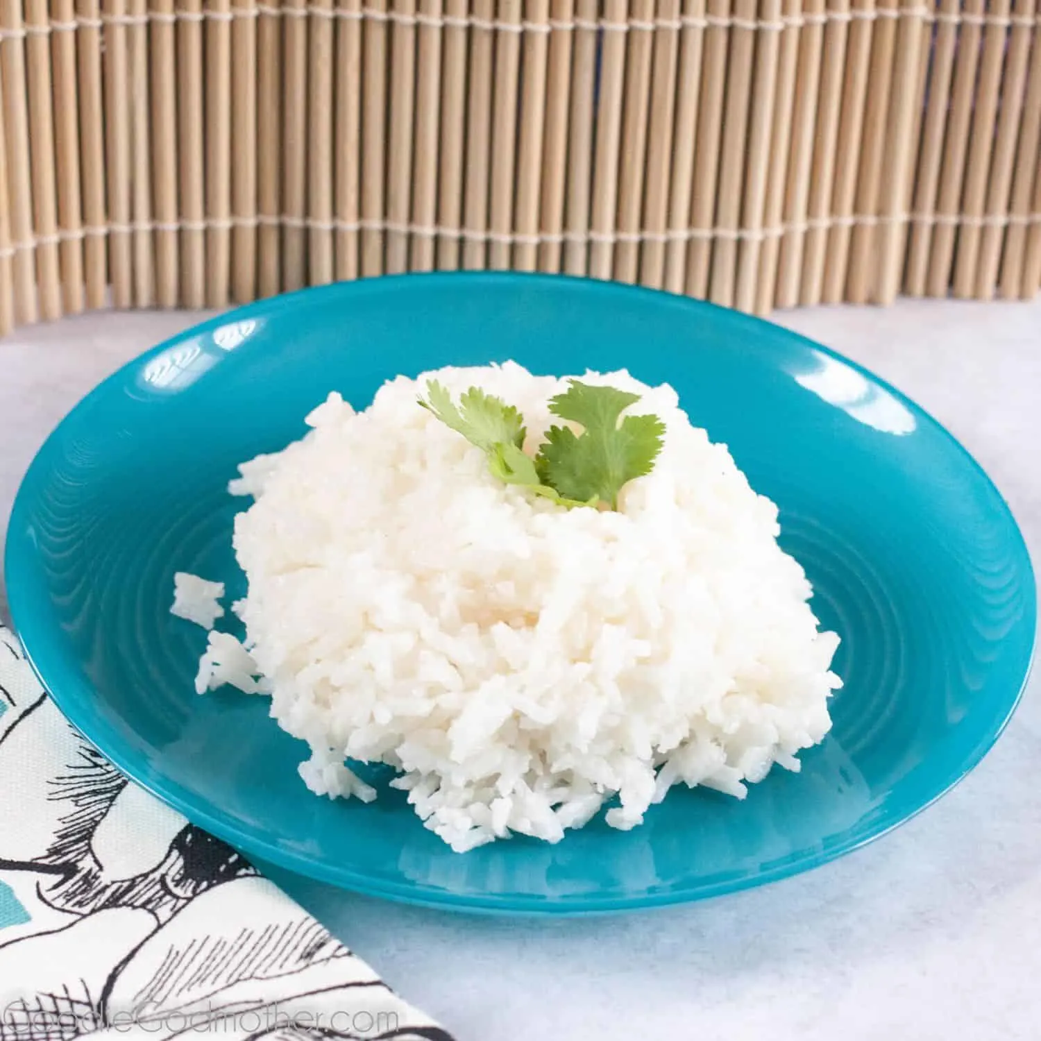 A unique and easy side dish, savory coconut rice pairs well with Thai food and tropical dishes. Learn how to make it on GoodieGodmother.com