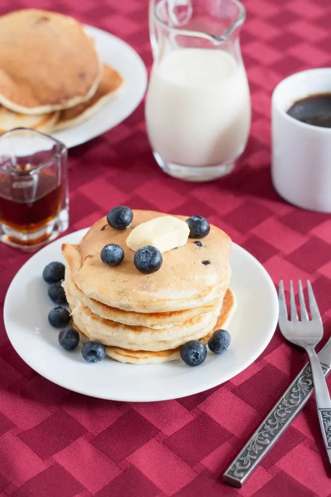 Make fluffy blueberry pancakes a little healthier by adding golden flax. Kid and husband approved! Recipe on GoodieGodmother.com
