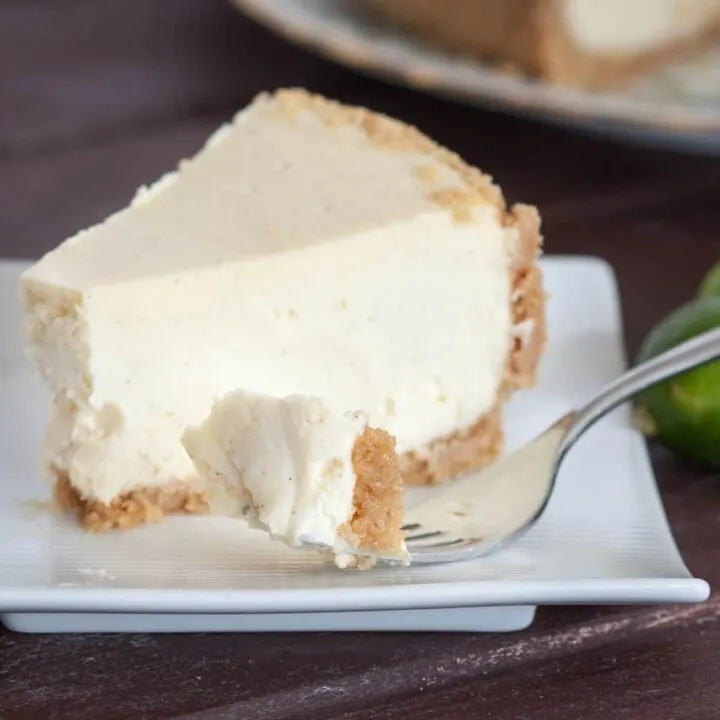 New York style key lime cheesecake recipe. Creamy without being heavy, with just the perfect touch of key lime flavor! Get the recipe on GoodieGodmother.com