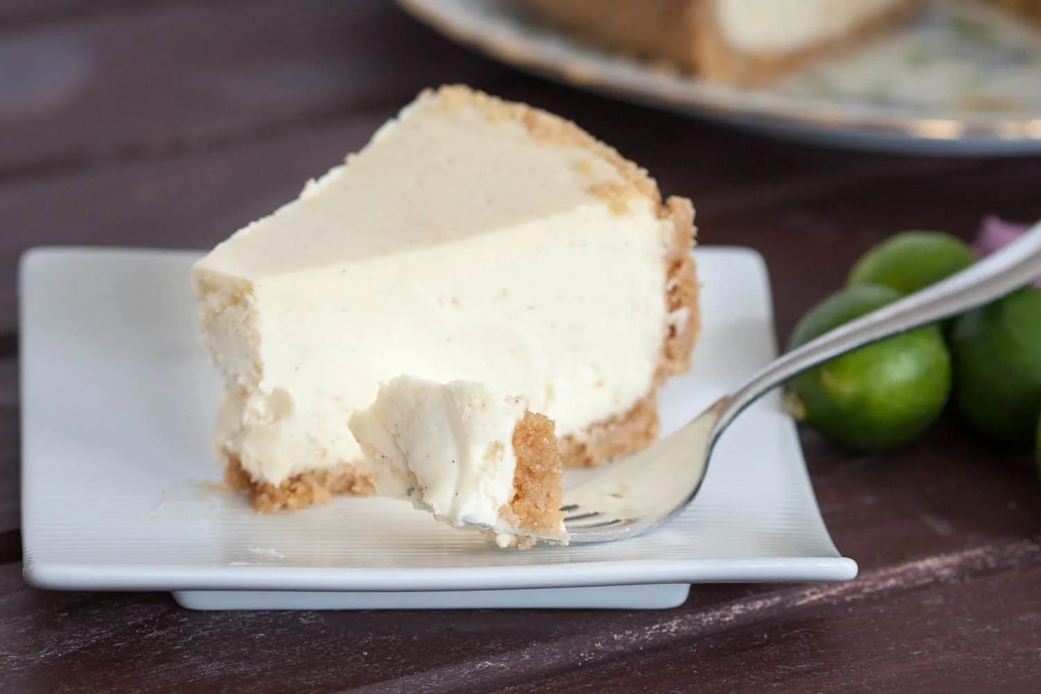New York style key lime cheesecake recipe. Creamy without being heavy, with just the perfect touch of key lime flavor! Get the recipe on GoodieGodmother.com