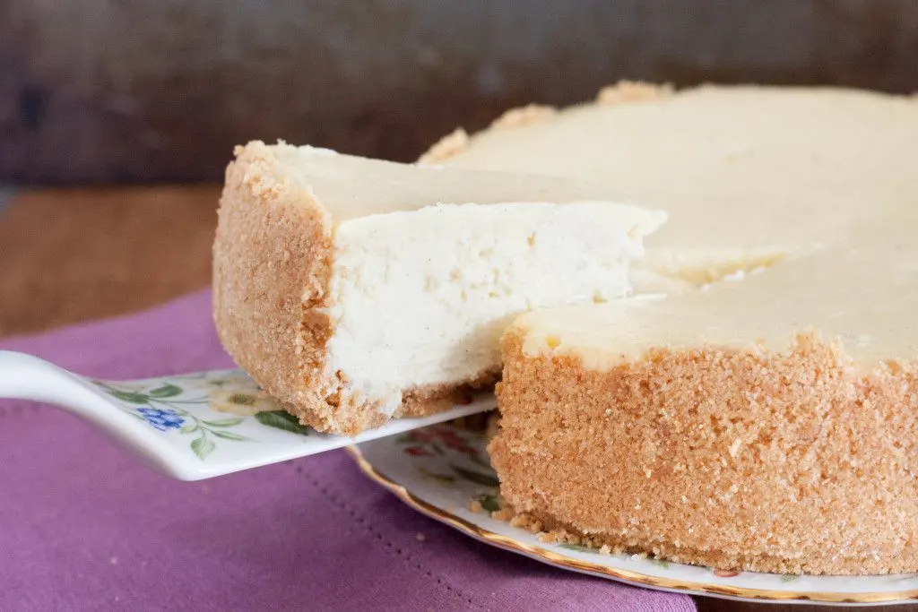 New York style key lime cheesecake recipe. Creamy without being heavy, with just the perfect touch of key lime flavor! Get the recipe on GoodieGodmother.com