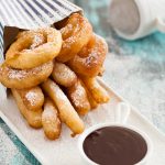 Spanish churros and chocolate are a common snack or even breakfast in Spain. This recipe - inspired by a trip to visit family - is a surprisingly easy Spanish treat. * Recipe on GoodieGodmother.com