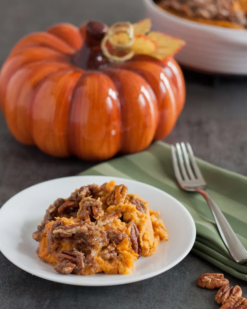 Need a "not too sweet" sweet potato casserole? This sweet potato casserole with pecans is a family favorite and so easy for Thanksgiving! * Recipe on GoodieGodmother.com