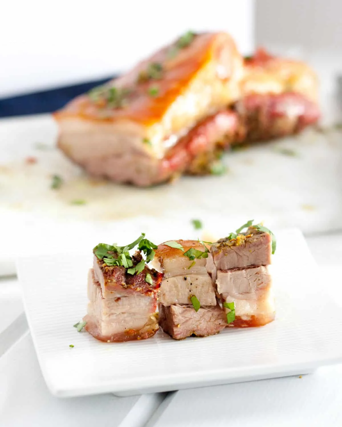 Crispy Pork Belly is easy to make in the oven. This recipe has a beautiful blend of flavors like tumeric, garlic, and cinnamon, so the leftovers are even better! Serve freshly roasted for Chinese New Year or cut into cubes and slices and pan fry for an extra crispy treat!