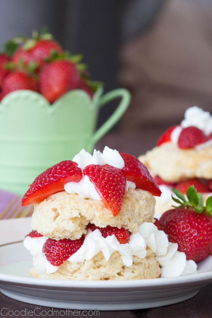 Easy strawberry shortcake recipe perfect for summer! Perfectly textured shortcake layered with homemade whipped cream and bright red strawberries!