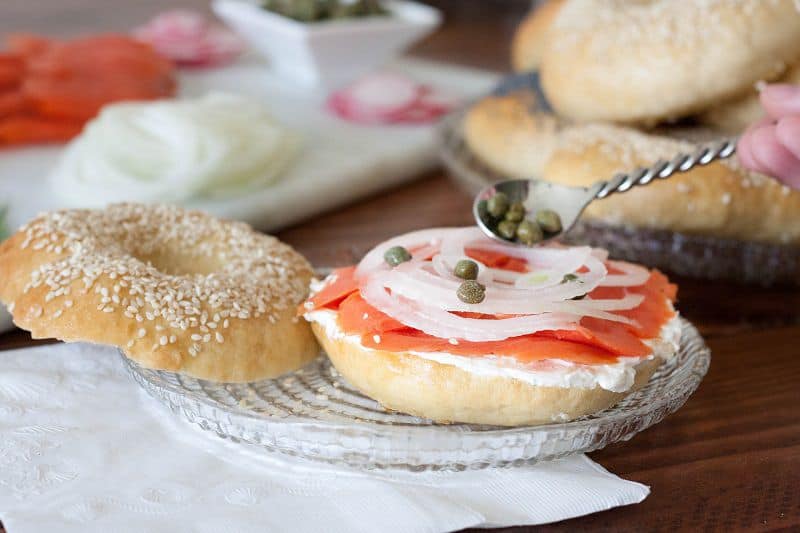 Smoked salmon, cream cheese, and bagels - a perfect weekend breakfast trifecta. Learn how to make the perfect lox and bagel sandwich and get tips for serving bagels to a crowd on GoodieGodmother.com