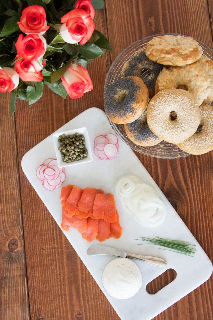 Smoked salmon, cream cheese, and bagels - a perfect weekend breakfast trifecta. Learn how to make the perfect lox and bagel sandwich and get tips for serving bagels to a crowd on GoodieGodmother.com