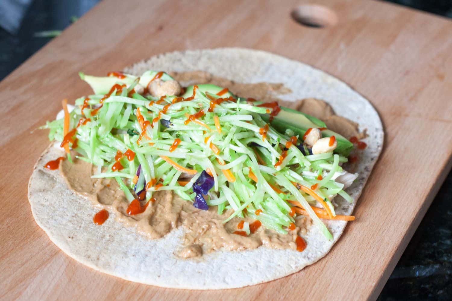 Easy Thai Peanut Wrap is a healthy make ahead quick meal. Get the recipe on GoodieGodmother.com