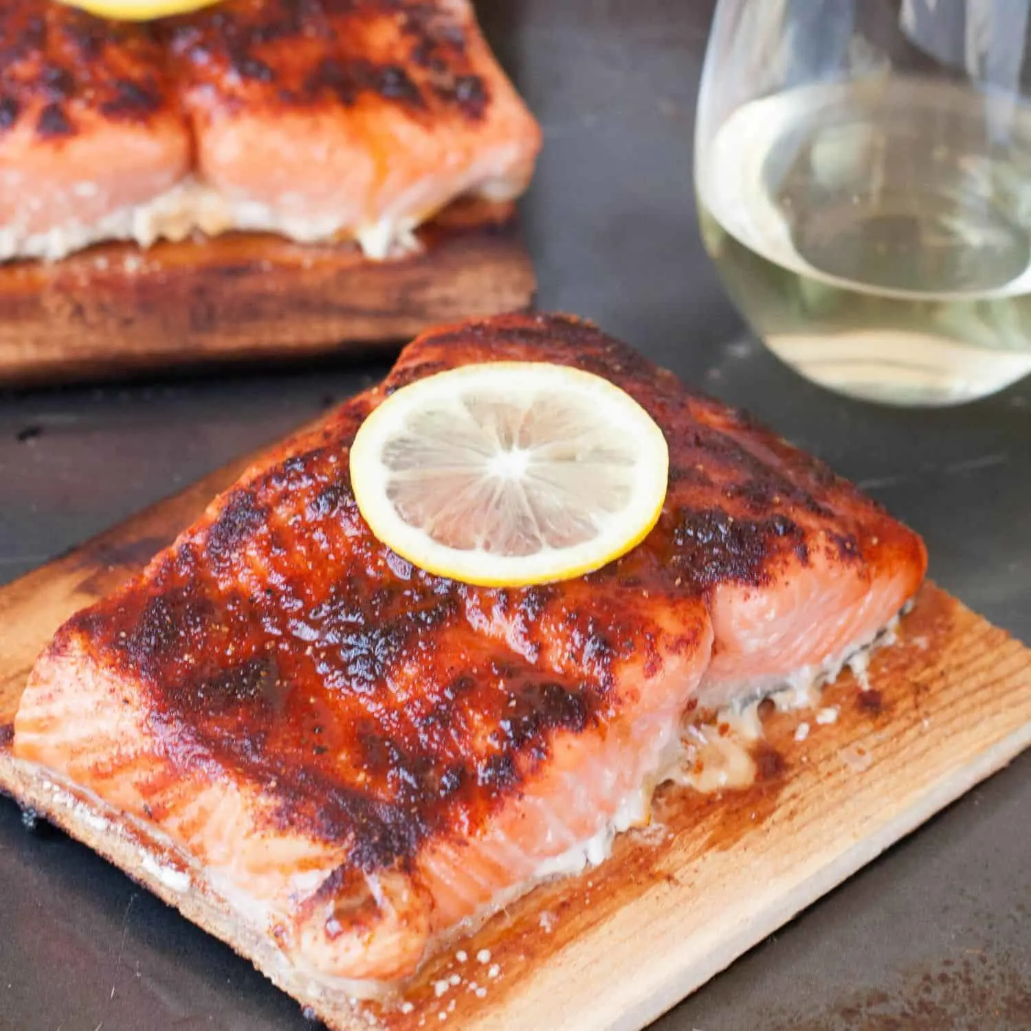 Individual cedar planks are an elegant way to prepare and plate salmon, and easier to make than you'd think! Recipe on GoodieGodmother.com