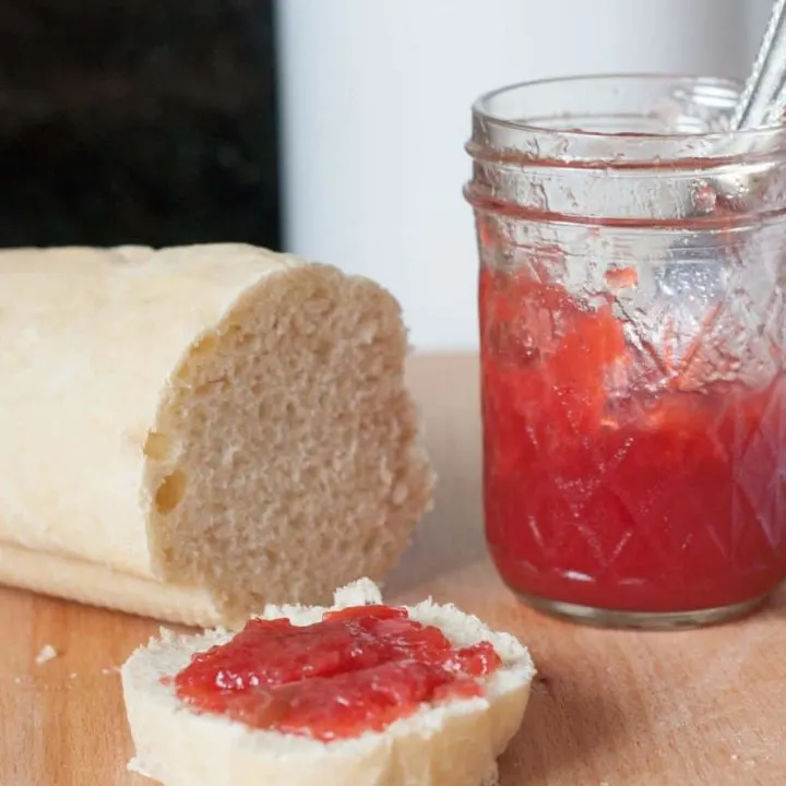 Low sugar strawberry rhubarb jam is an easy way to preserve summer flavors for gifting or year-round enjoyment. Recipe on GoodieGodmother.com