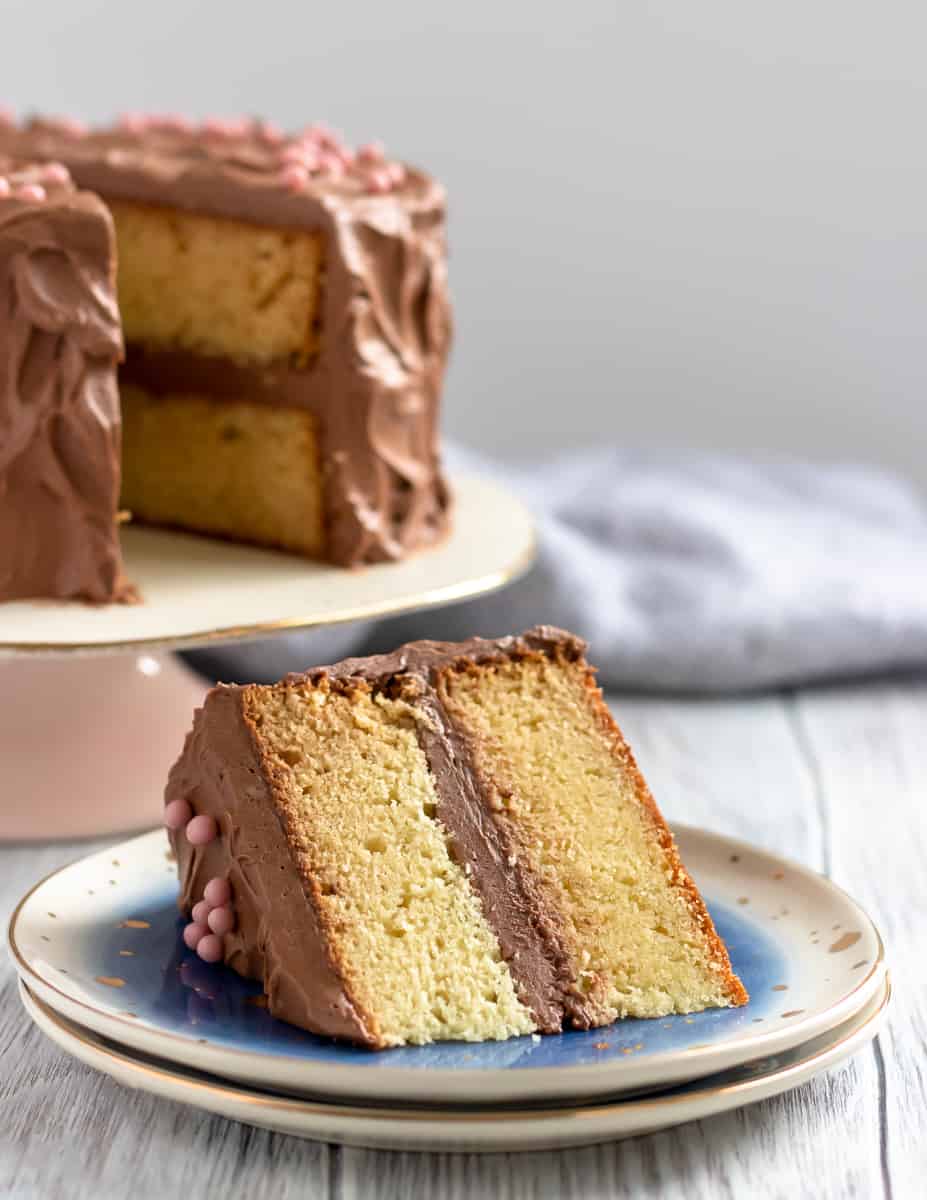 When you need a classic vanilla cake, this yellow cake recipe from scratch is what you want! A moist and flavorful butter cake, this from scratch vanilla cake recipe is a sure to please your people. * Recipe on GoodieGodmother.com