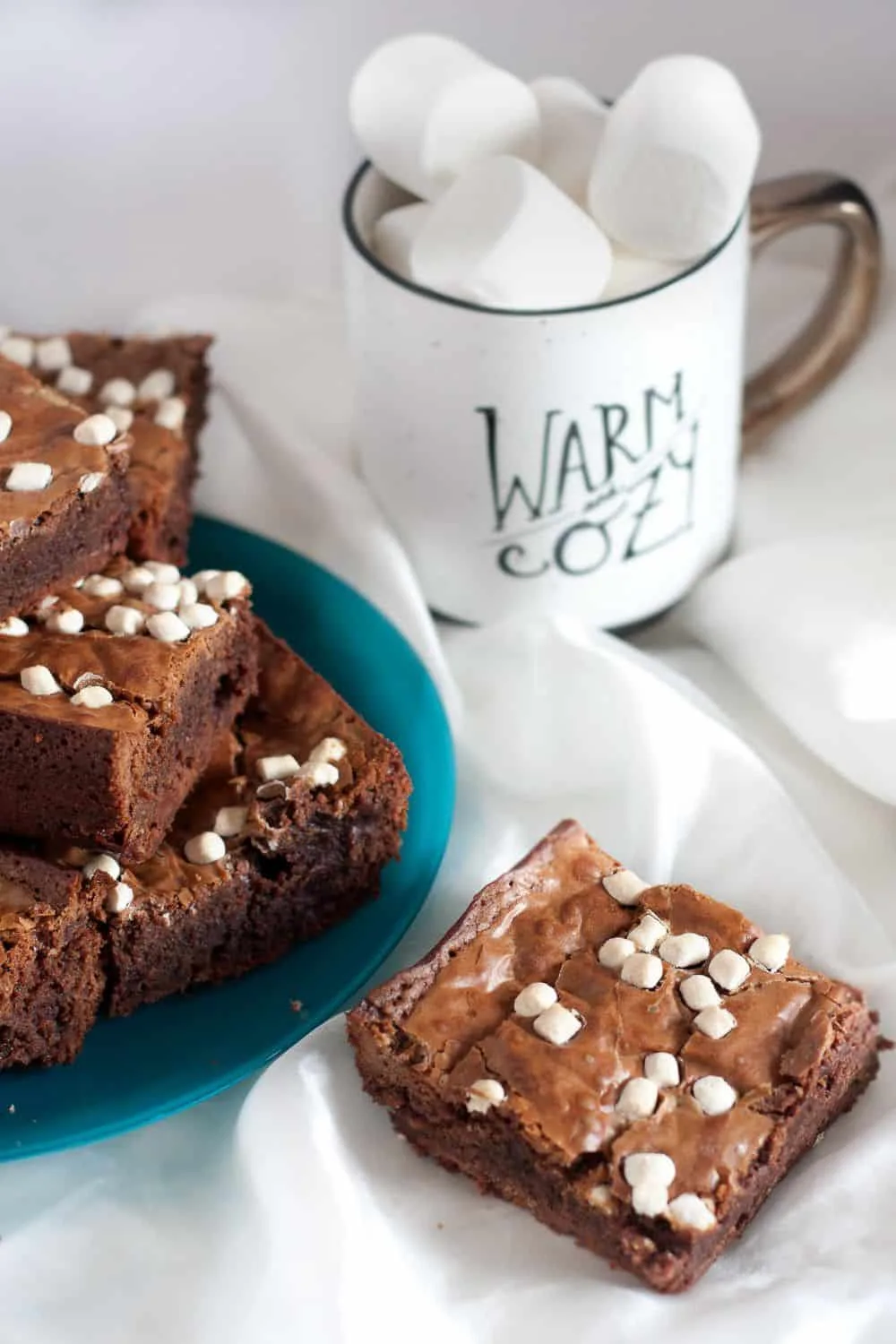 To die for caramel hot chocolate brownies! A fudgy, creative dessert using hot chocolate mix. Drizzle with extra caramel after baking for a super decadent treat.