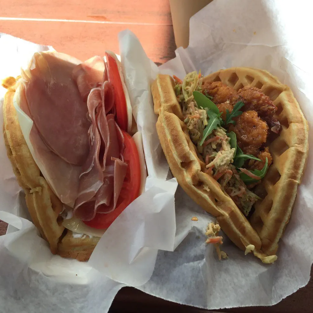 Savory waffles at Magic Kingdom. Prosciutto and swiss on the left, sweet and spicy chicken on the right.