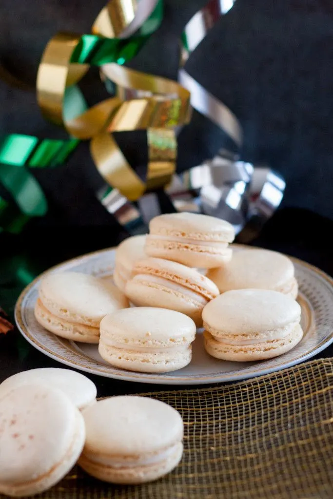 Homemade eggnog macarons - a perfect Christmas cookie treat! Eggnog macaron recipe on GoodieGodmother.com