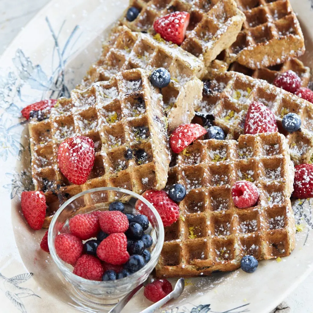 Gluten Free Lemon Blueberry Waffles - 25 Amazing Brunch Recipes you should resolve to make in 2016! Get the full list on GoodieGodmother.com