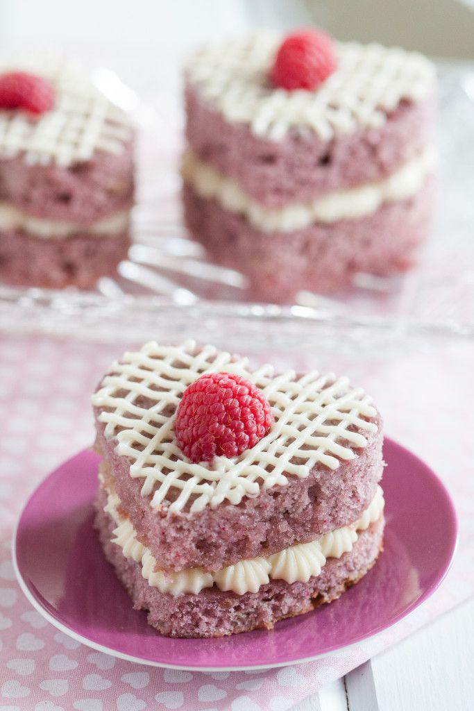 Fresh Raspberry Mini Cakes - A perfect Valentine's Day dessert without chocolate! These are so easy to make, even for a novice baker. They're the perfect size for eating alone, sharing with someone you love, or they package beautifully for a thoughtful gift. Recipe on GoodieGodmother.com