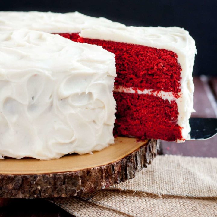 Perfect Red Velvet Cake Recipe FROM SCRATCH! Just the right hint of chocolate with a kick, it's everything you'd want from a classic Southern red velvet. Bakes perfectly as a layer cake or cupcakes with no modification. Recipe on GoodieGodmother.com
