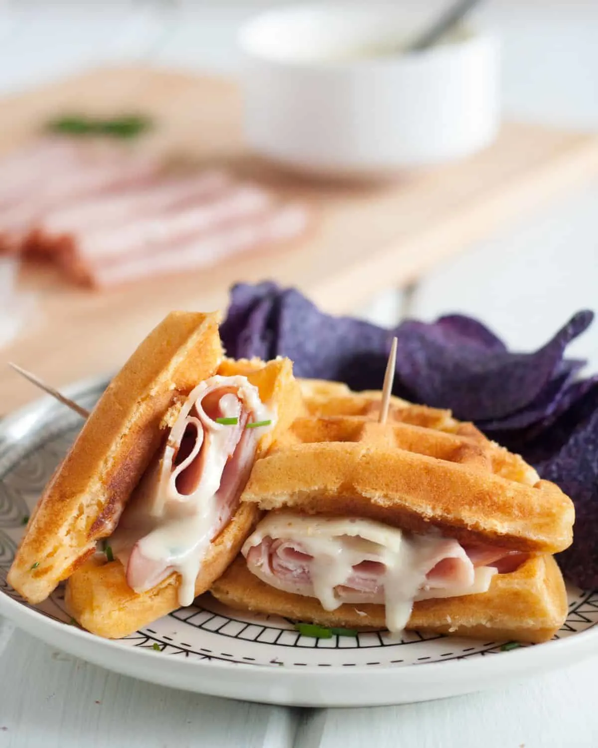A Croque Monsieur Waffle Sandwich is a great alternative to traditional brunch dishes. It also makes a great lunch and a unique breakfast-for-dinner dinner idea! Get the easy recipe on GoodieGodmother.com
