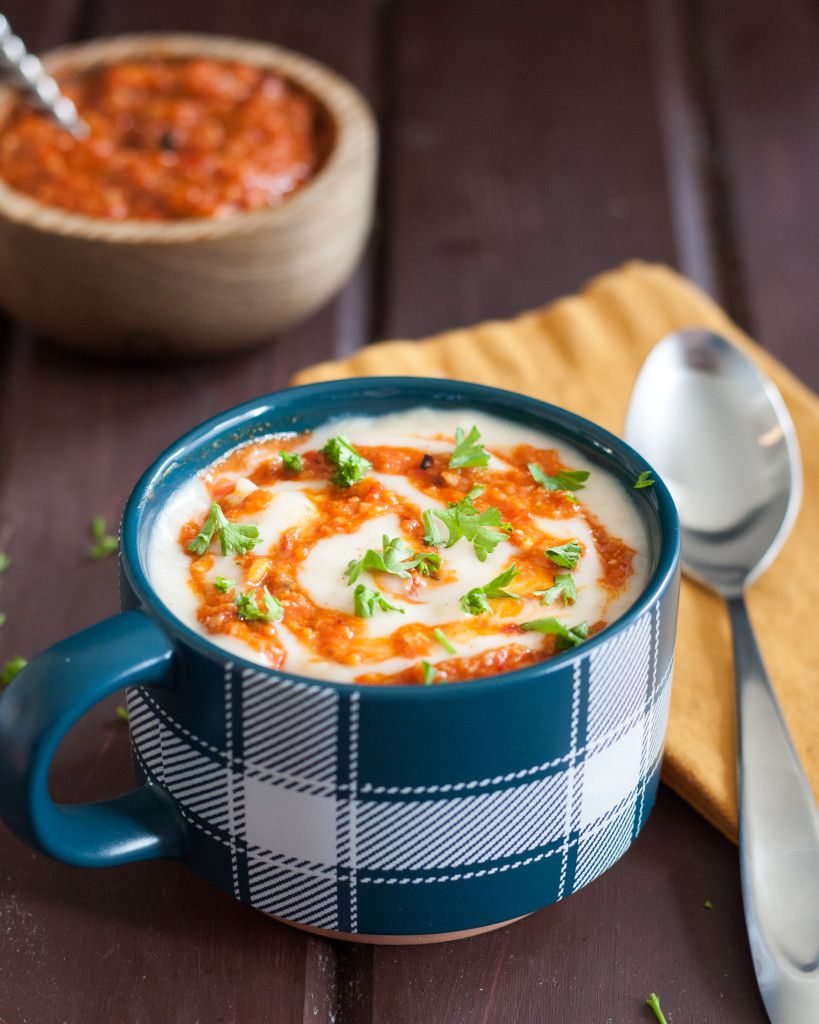 A classic potato soup recipe is extra delicious topped with romesco sauce! It's a great weekend dinner idea, and reheats well for lunch the next day. Recipe on GoodieGodmother.com