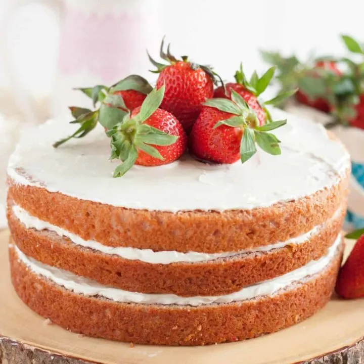 No artificial colors, all natural flavor, this fresh strawberry cake from scratch is a perfect dessert for strawberry season! * GoodieGodmother.com