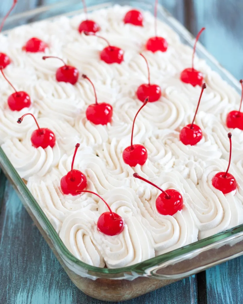 Tres Leches Cake - Three Milks Cake - is an easy and popular poke cake in Latin America. Try this recipe and you'll see why! * GoodieGodmother.com