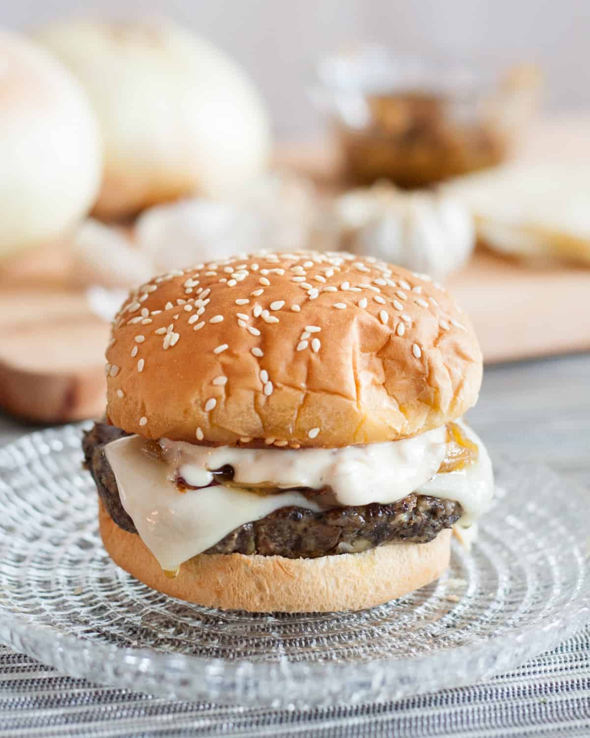 Vegetarian Mushroom Burgers with a garlic aioli - the most incredible mushroom Swiss burgers, and they're VEGETARIAN! Recipe on GoodieGodmother.com