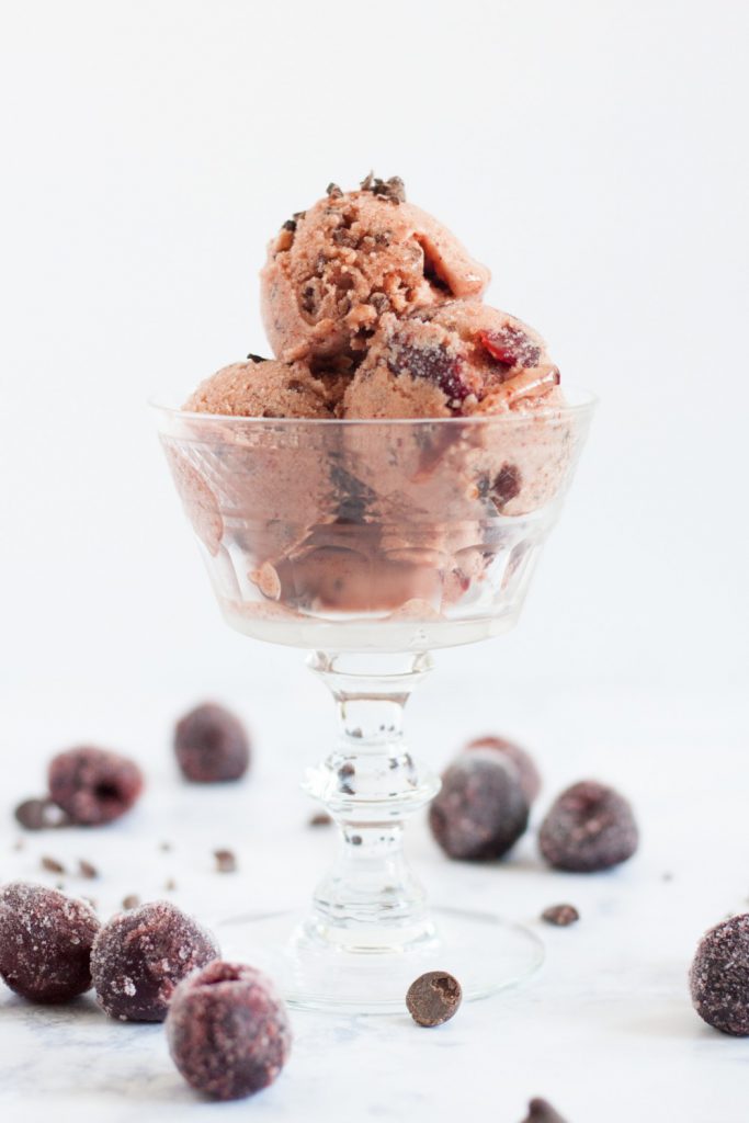 A unique banana ice cream flavor inspired by Cherry Garcia! This chocolate cherry banana ice cream is easy to make, soft straight out of the freezer, and is a "clean eating" dessert! * GoodieGodmother.com