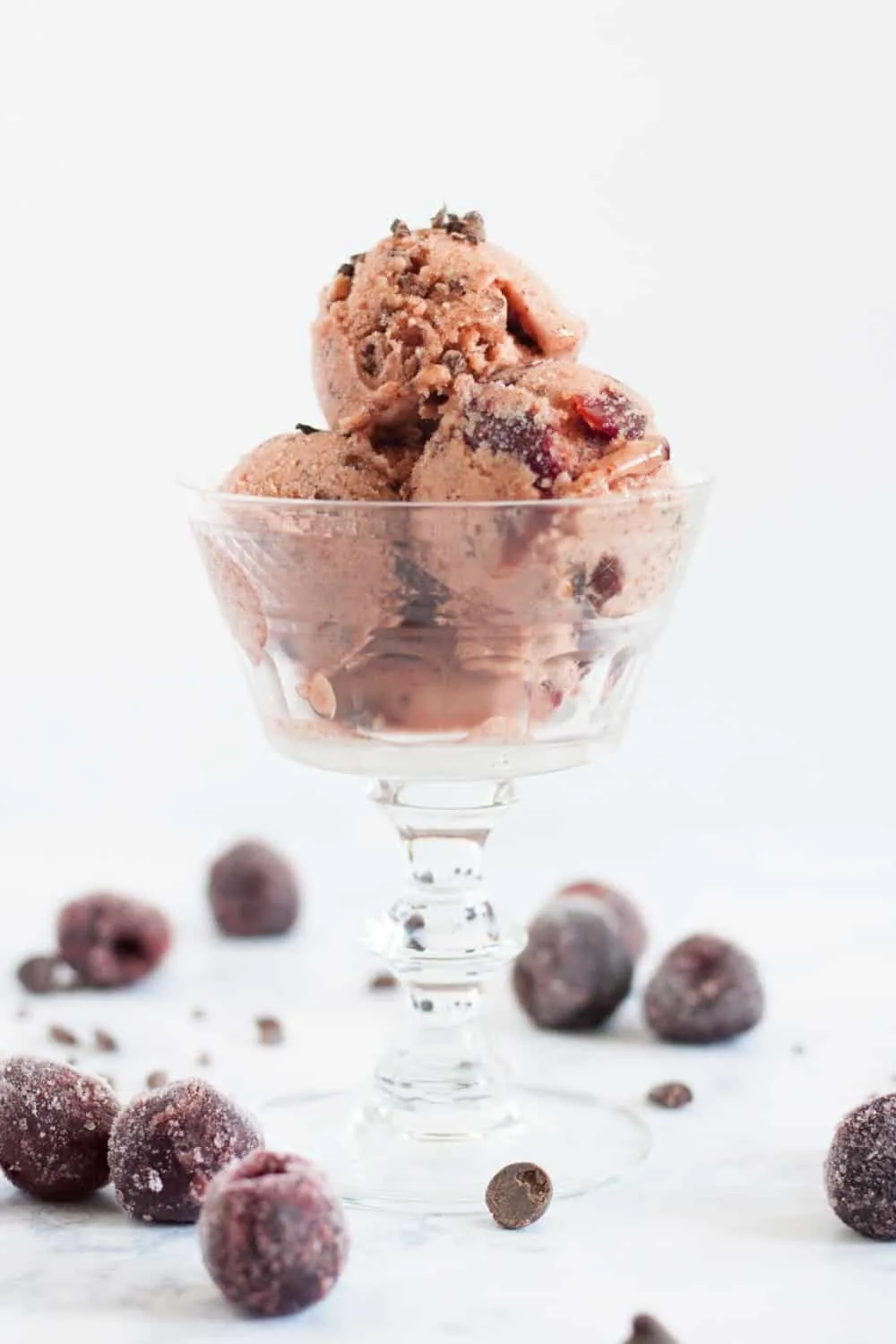 A unique banana ice cream flavor inspired by Cherry Garcia! This chocolate cherry banana ice cream is easy to make, soft straight out of the freezer, and is a 