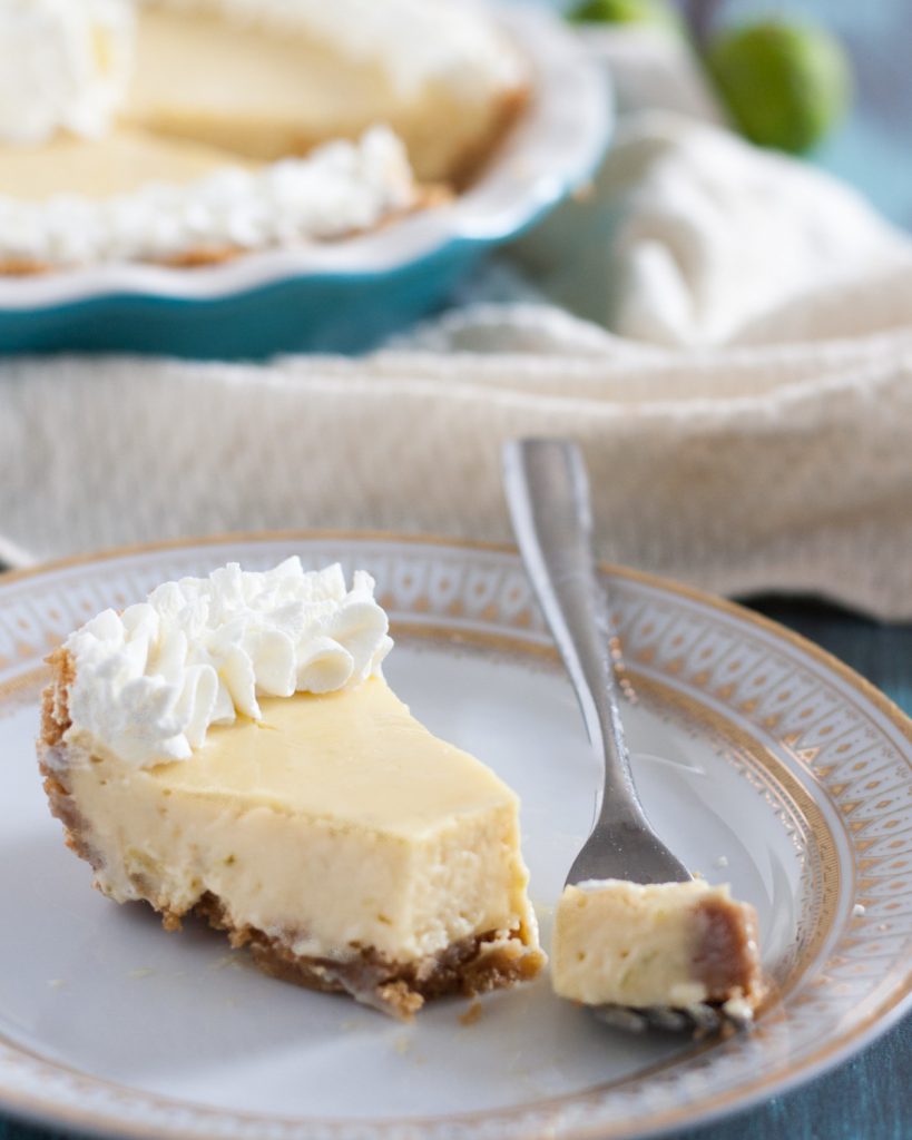 Key Lime Pie is a quintessential summer dessert! Enjoy this easy creamy tart version anytime you need to find yourself in a Key West frame of mind! * GoodieGodmother.com