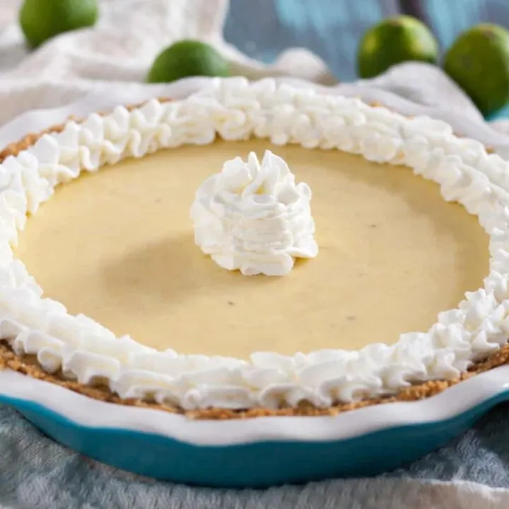 Key Lime Pie is a quintessential summer dessert! Enjoy this easy creamy tart version anytime you need to find yourself in a Key West frame of mind! * GoodieGodmother.com