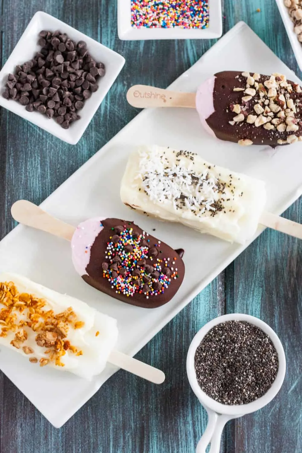 Set up a chocolate dipping station for fruit pops at your next summer party! It's an easy and interactive dessert your guests will love! #ad #SnackBrighter