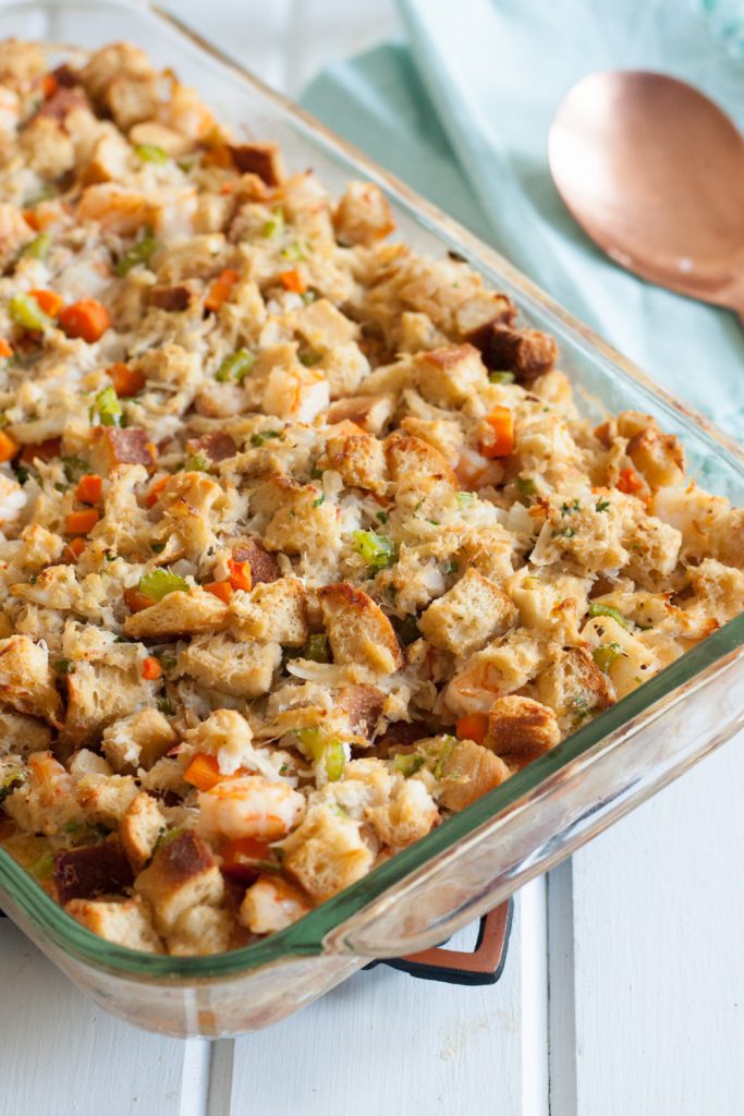 Who says Thanksgiving dinner can't have a coastal touch? This flavorful seafood stuffing is loaded with crab and shrimp but pairs beautifully with turkey. A "must save" for Thanksgiving! * Mid-Atlantic Seafood Stuffing (Dressing) recipe on GoodieGodmother.com
