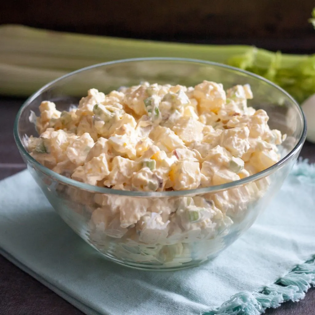 Southern Style Potato Salad - A summer picnic classic, this easy salad is loaded with flavor and always one of the most popular dishes at any meal! * Recipe on GoodieGodmother.com