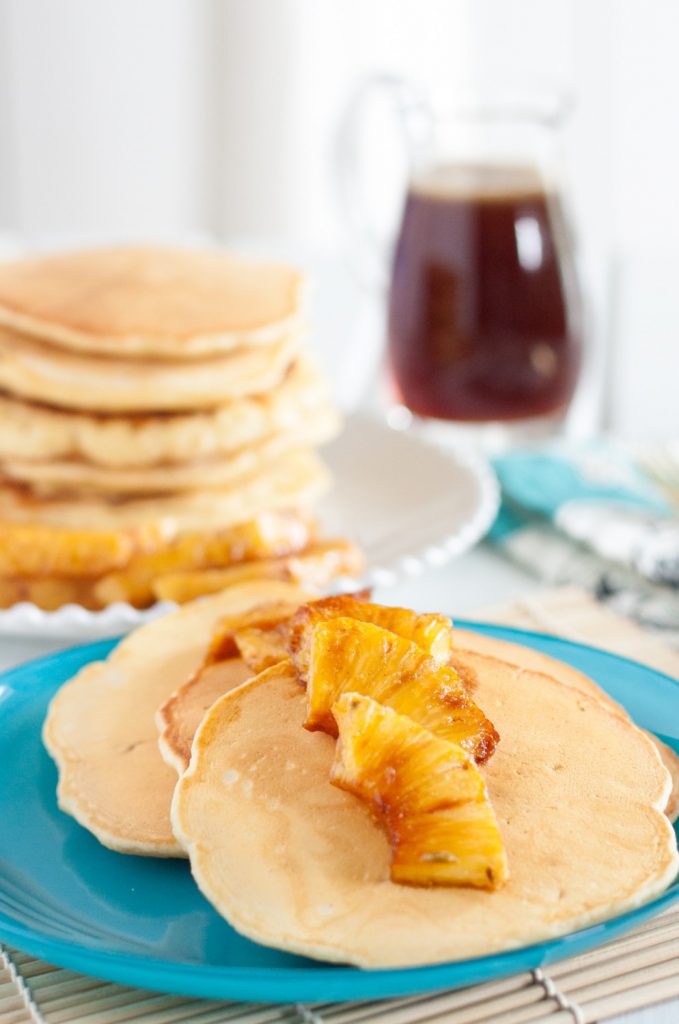 Caramelized Pineapple Pancakes with Butter Rum Syrup - A decadent and delicious brunch recipe on GoodieGodmother.com