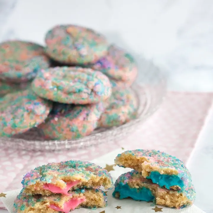Go beyond cake with your gender reveal ideas! Gender reveal cookies are a unique way to share your baby's gender with a group, or with family and friends far away - they ship! * Recipe and Video Tutorial on GoodieGodmother.com