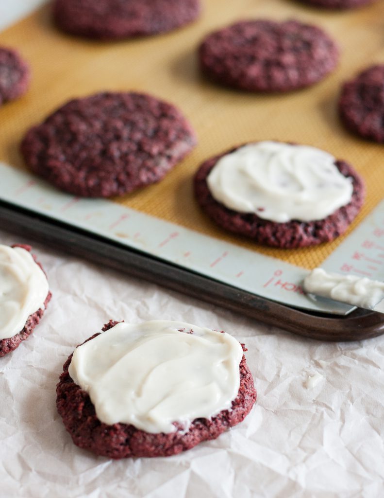 Perfect for Christmas, Valentine's Day, or really any time you need a treat, these soft frosted vegan red velvet cookies are delightful! * Recipe on GoodieGodmother.com