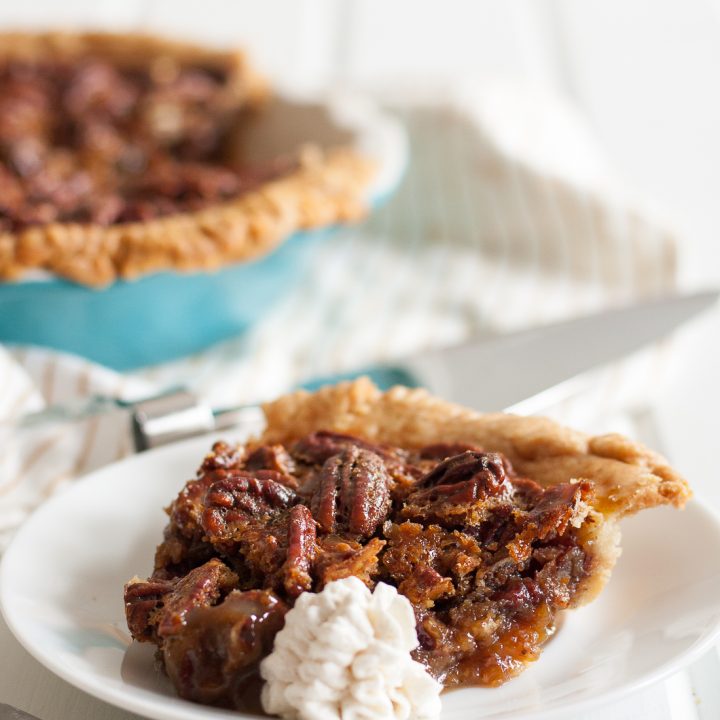 White Russian Pecan Pie - inspired a little by happy hour, a lot by a road trip, this unique pecan pie recipe is amazing! It's a must for our Thanksgiving table. * Recipe on GoodieGodmother.com