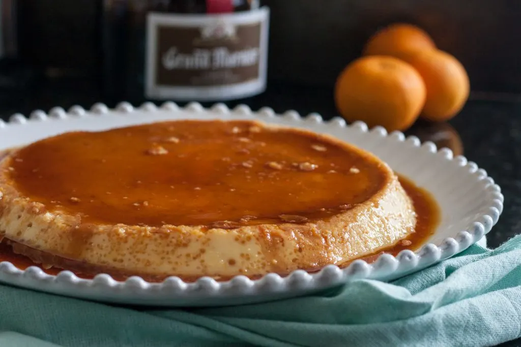 Classic flan gets a citrus liquor twist in this Grand Marnier flan recipe. Flan is a delicious, cooling, custard dessert common in Latin cuisine. * Recipe on GoodieGodmother.com