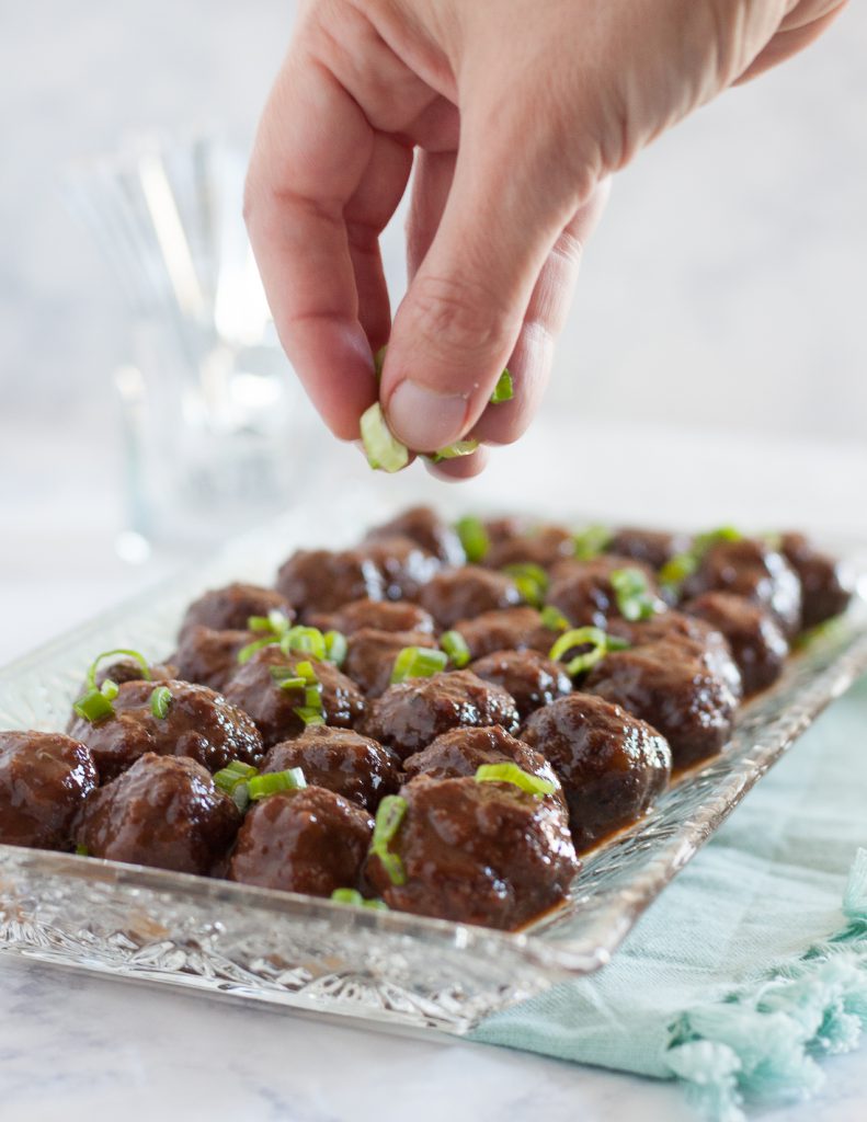 Slow cooker guava glazed meatballs is a great dish to serve at parties! This recipe is a unique spin on traditional slow cooker meatball recipes. * Recipe on GoodieGodmother.com