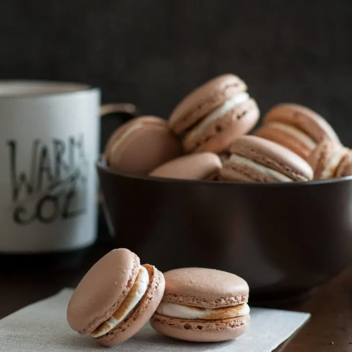 The weather outside is frightful, but hot chocolate macarons are sure to warm your heart - delightful fireplace burning or not. * Recipe on GoodieGodmother.com