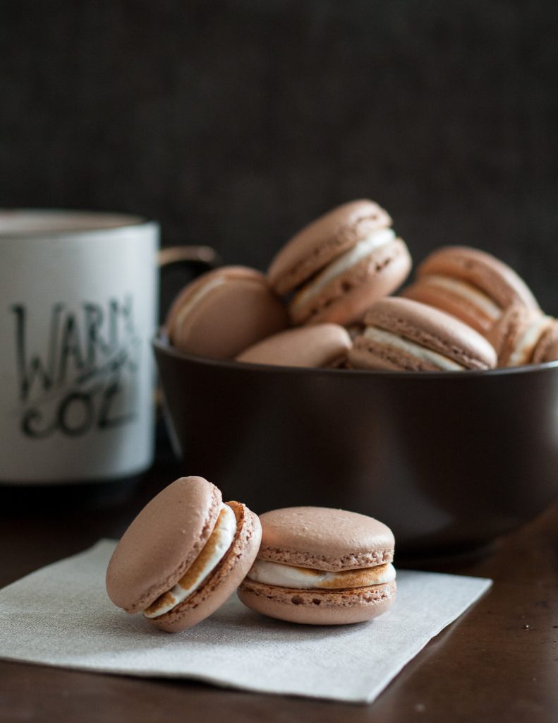 The weather outside is frightful, but hot chocolate macarons are sure to warm your heart - delightful fireplace burning or not.  * Recipe on GoodieGodmother.com