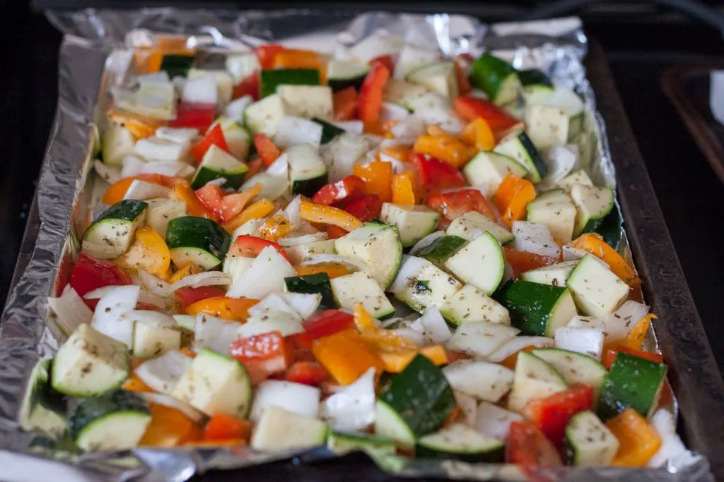 Simple, fresh flavors are the best way to dress up this colorful Greek oven roasted vegetables dish. * Recipe on GoodieGodmother.com