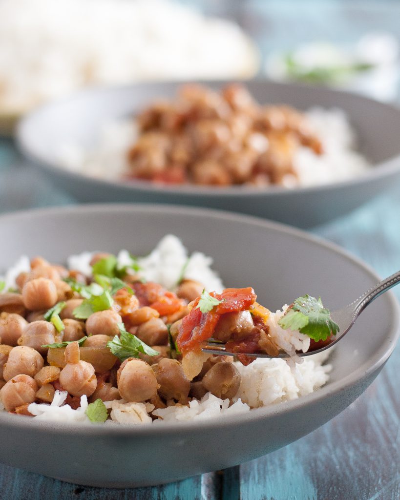 This easy slow cooker chickpea curry is a perfect, economical vegetarian dinner recipe! Recipe includes notes for making this in the Instant Pot too. * GoodieGodmother.com