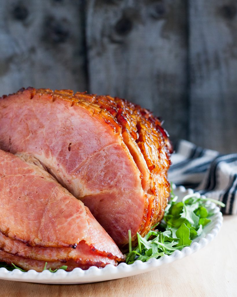 Make your baked ham extra special with a homemade glaze. It takes just 5 minutes to make the glaze for this bourbon honey glazed ham! * Recipe on GoodieGodmother.com
