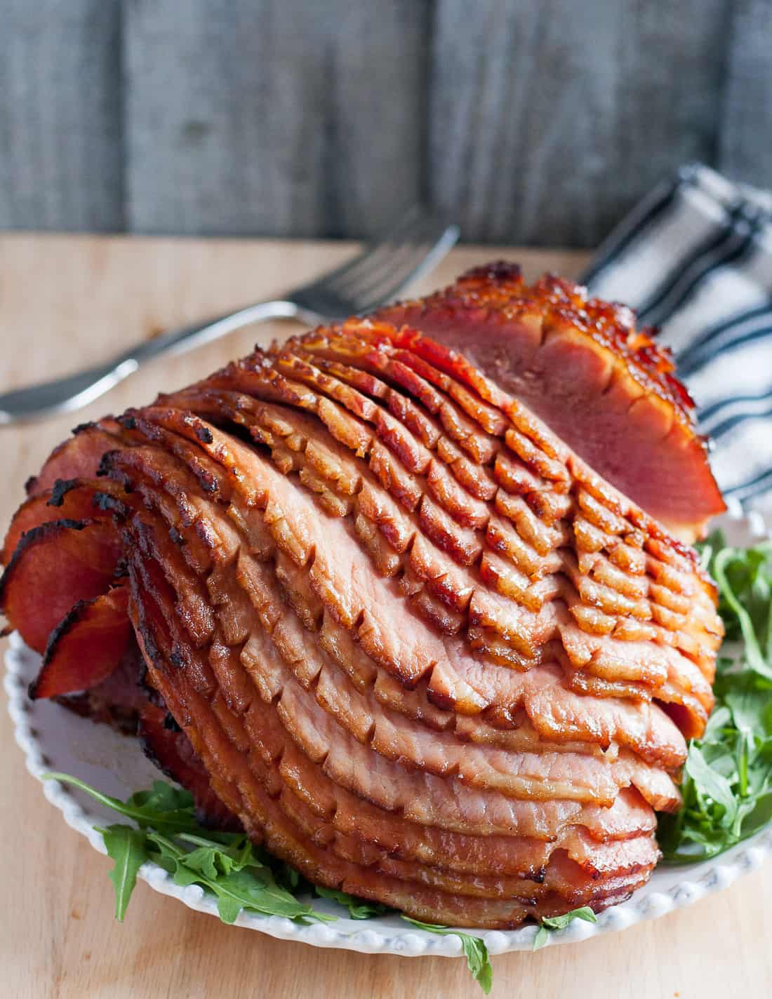﻿Make your baked ham extra special with a homemade glaze. It takes just 5 minutes to make the glaze for this bourbon honey glazed ham! * Recipe on GoodieGodmother.com