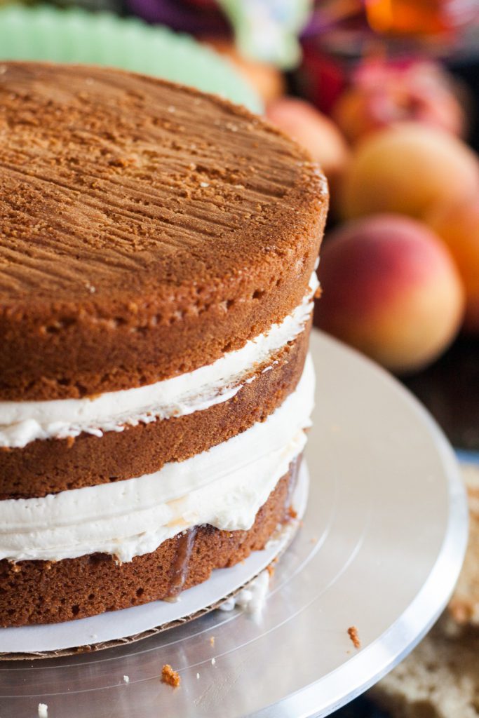 Fresh peaches, and a little peach wine, make this peach wine cake from scratch a delicious cake fit for a Southern belle!  * GoodieGodmother.com
