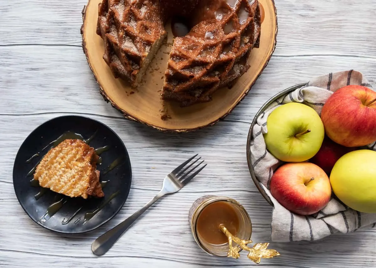 Imagine fall in a bite. This caramel apple cider bundt cake is like the cake version of apple cider doughnuts, with loads more apple flavor, and caramel. *Apple Cider Doughnut Cake Recipe on GoodieGodmother.com