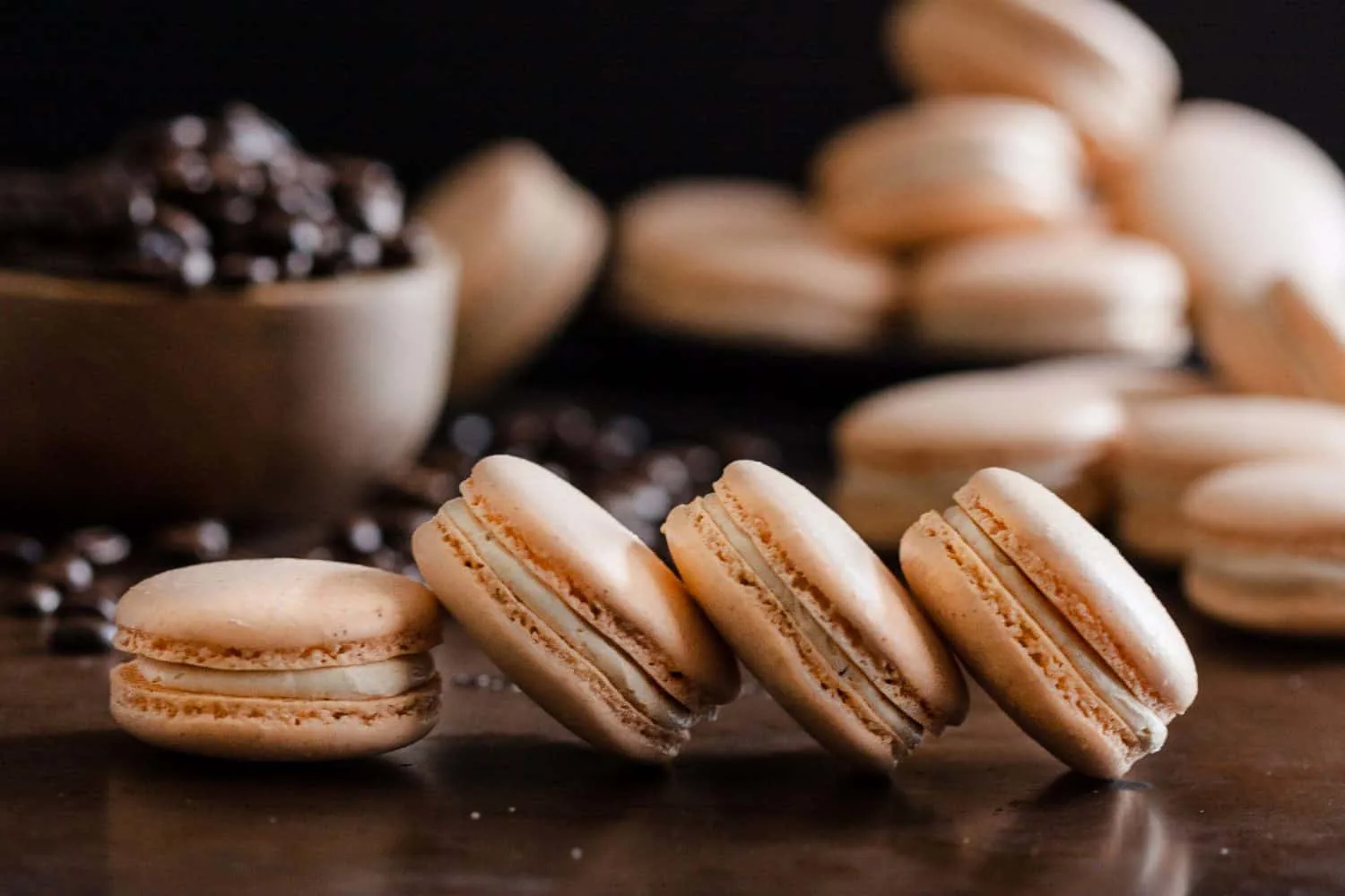 Pumpkin spice latte macarons are a fun take on a classic fall coffeehouse drink! * Recipe on GoodieGodmother.com